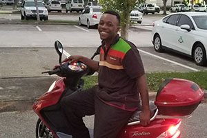 Jakeem on a scooter Jakeem on a scooter