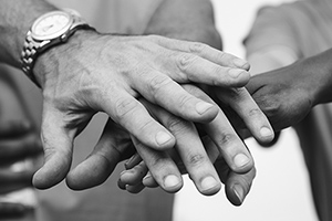 Hands stacked on one another